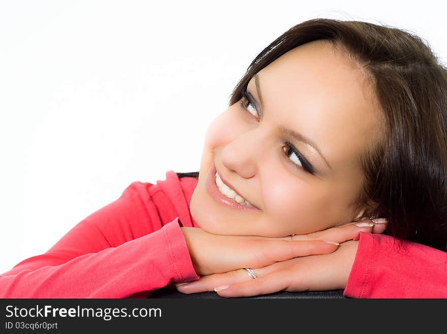 Beautiful girl in the red on a white background