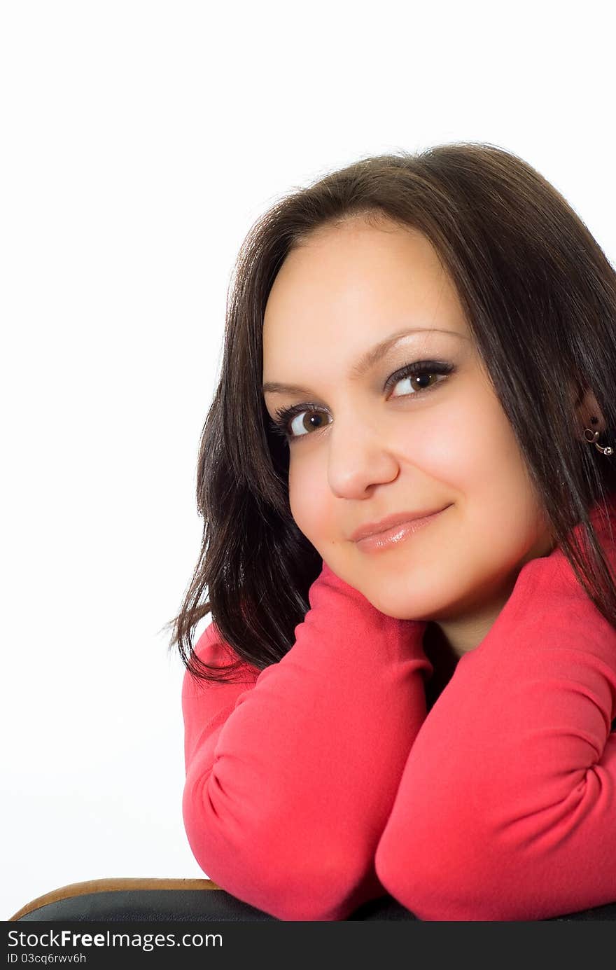 Beautiful girl in the red on a white background