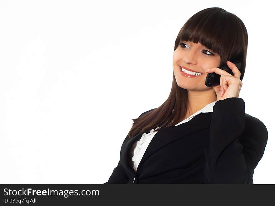 Beautiful girl in a black business suit with a white background