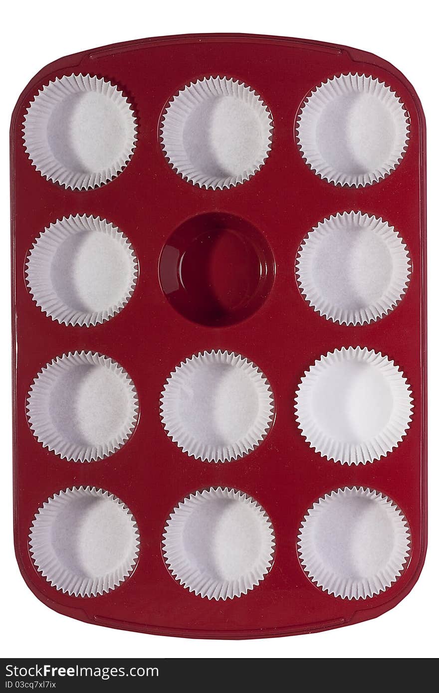 Silicone bakeware red with paper cups for baking.