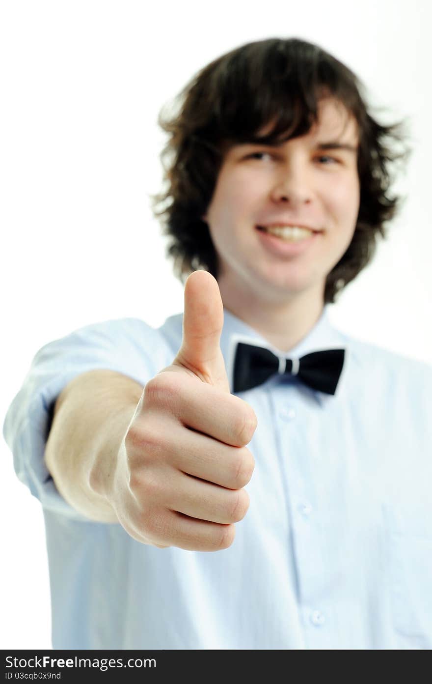 An image of a young handsome man showing his thumb