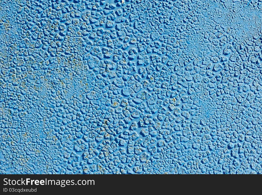 An image of a blue background of weathered surface