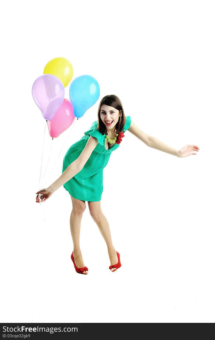 A young beautiful woman with bright balloons. A young beautiful woman with bright balloons