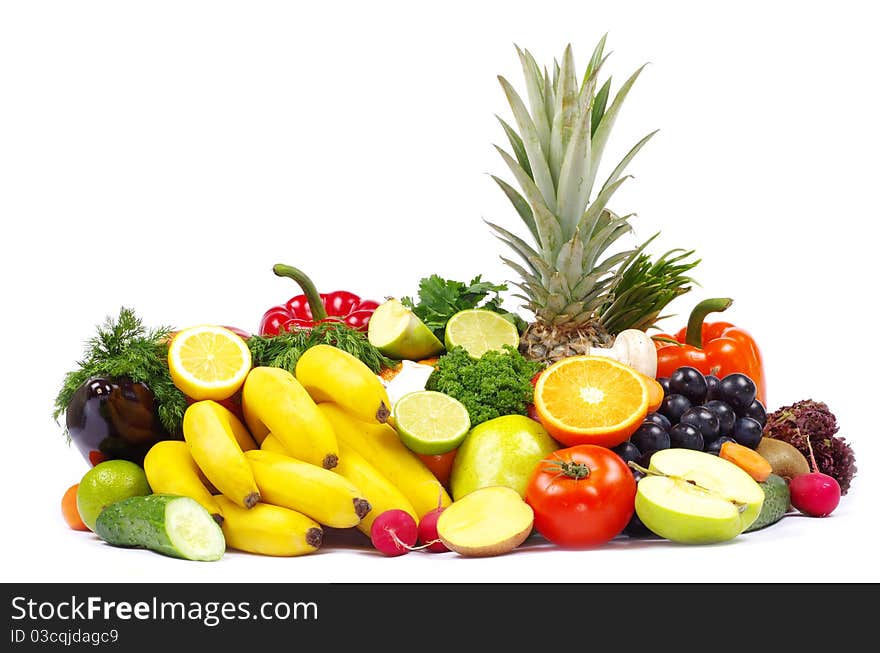 Fresh vegetables and fruits on white