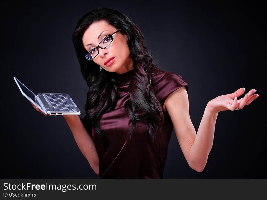 Business woman with a computer in hands