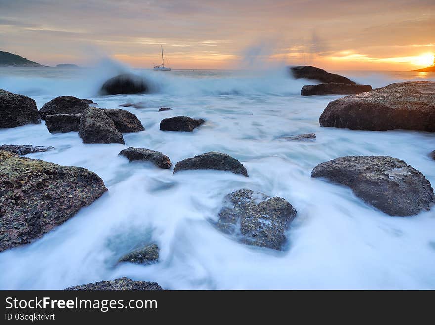 Sea waves lash line impact rock on the beach. Sea waves lash line impact rock on the beach