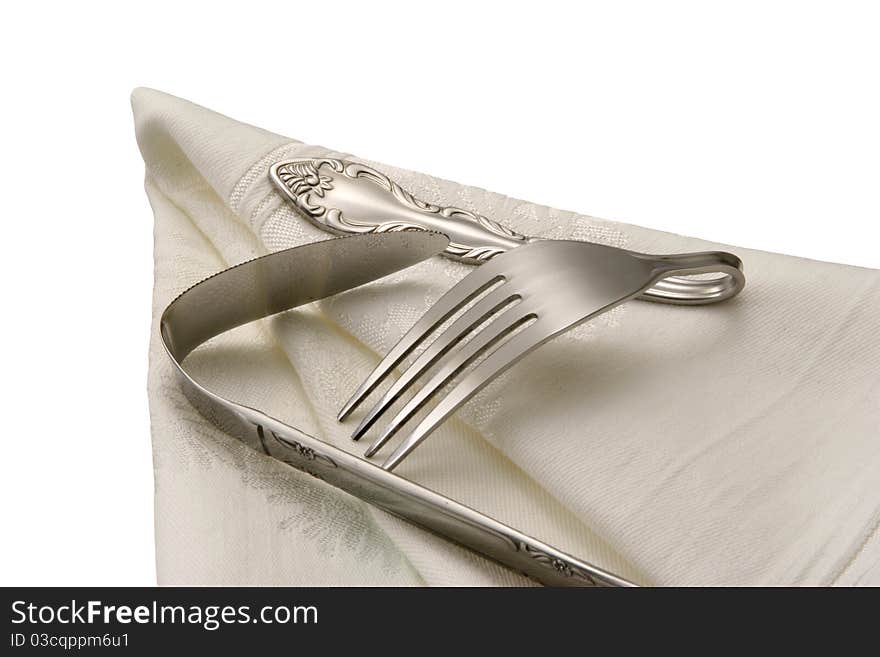 Fork and knife, isolated 
on a white background. Fork and knife, isolated 
on a white background.