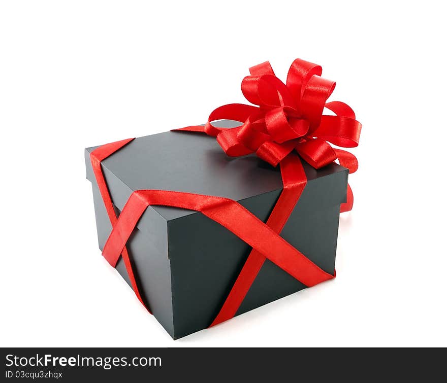 Gift box with a red bow isolated on white background