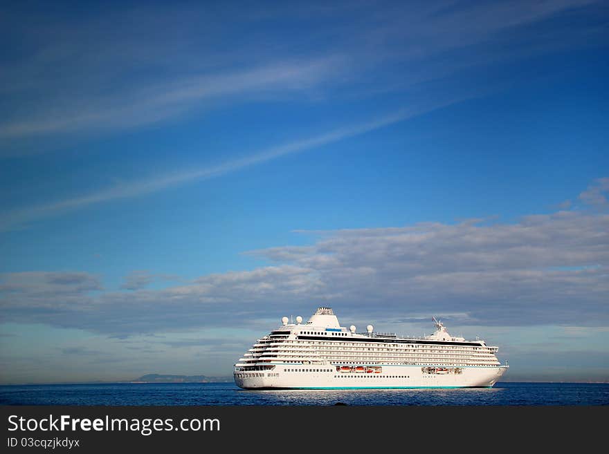 Large Cruise Liner, anchored in Italia port.