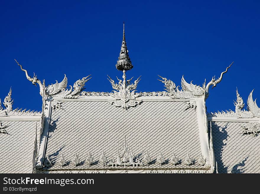 Wat Rong Khun is the white unique temple in the north of Thailand. Wat Rong Khun is the white unique temple in the north of Thailand