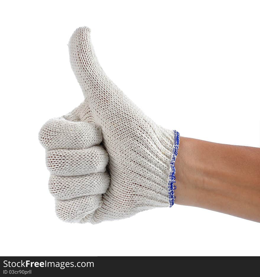 Hand with white fabric glove showing thumb up