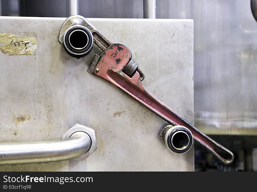 Industrial wrench exposed in a factory.