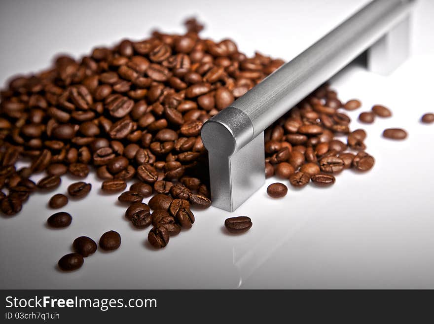 The door handle and coffee grains