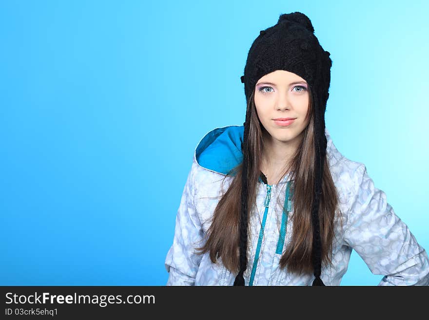 Happy girl teenager over blue background. Happy girl teenager over blue background.