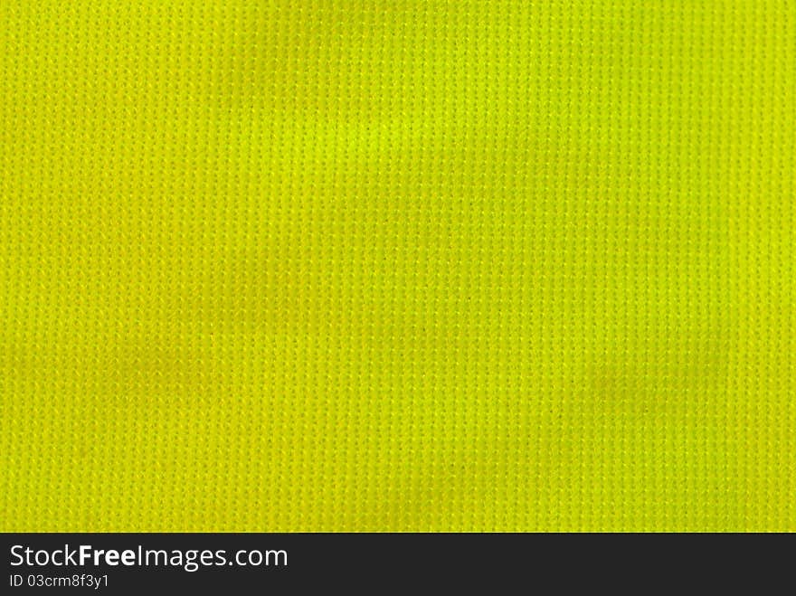 Close up of yellow fluorescent safety vest. Close up of yellow fluorescent safety vest