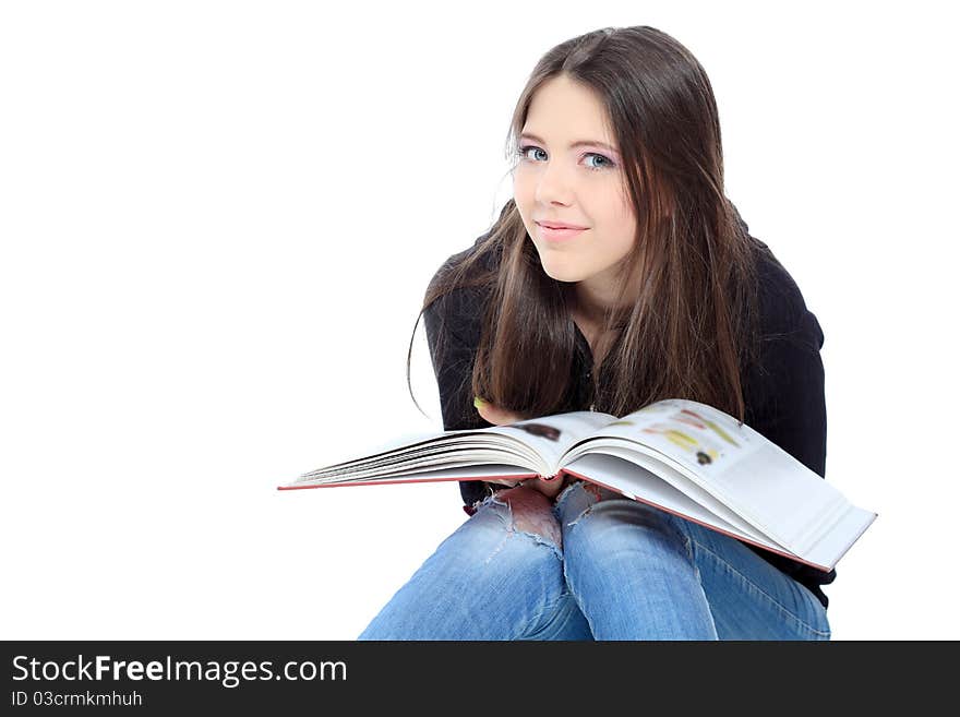 Portrait of a girl teenager reading book. Isolated over white background. Portrait of a girl teenager reading book. Isolated over white background.