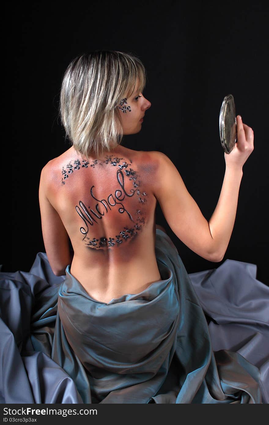 Woman with a male name on the back, a gift man