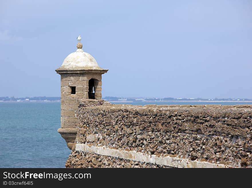 Old lookout tower watching over the sea