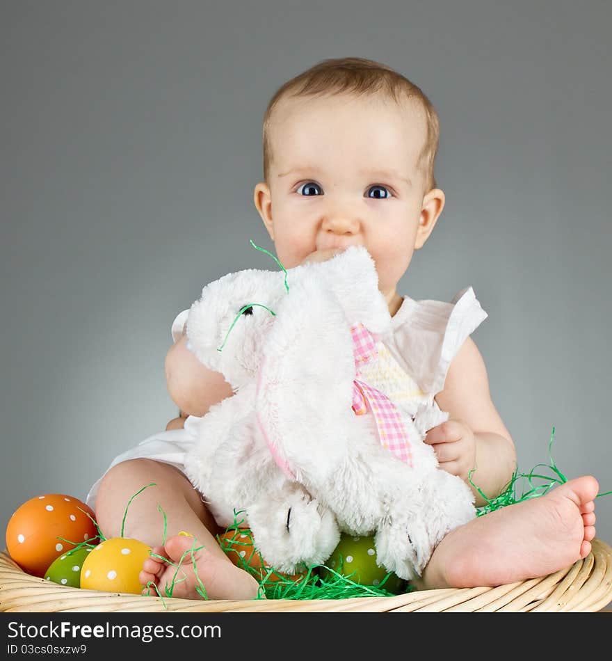 Young cute baby in an easter setting