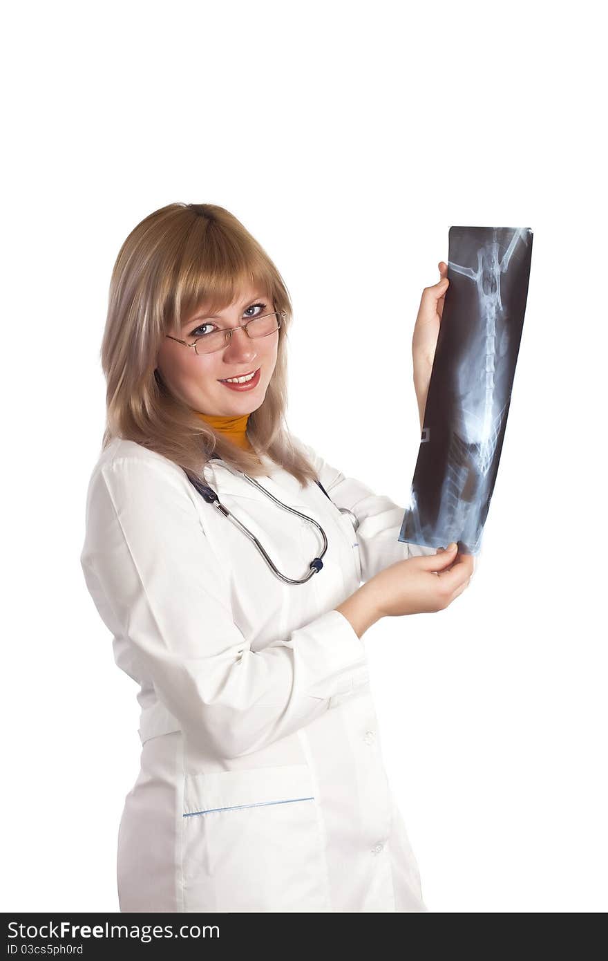 Smiling medical doctor woman with stethoscope and X-ray picture. Isolated on the white background