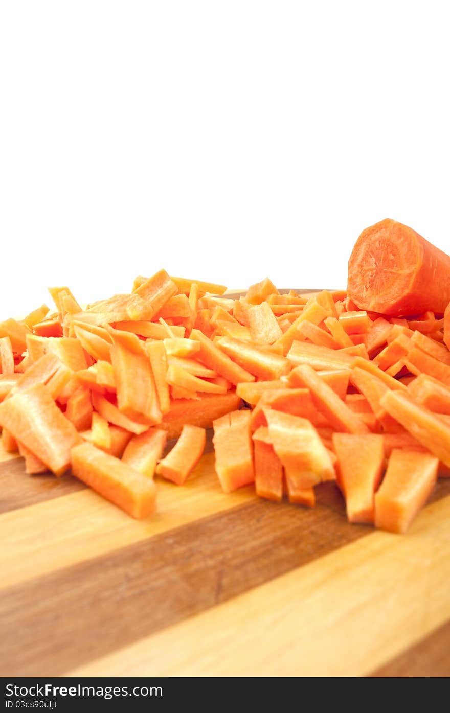 Carrot on the board isolated on a white background