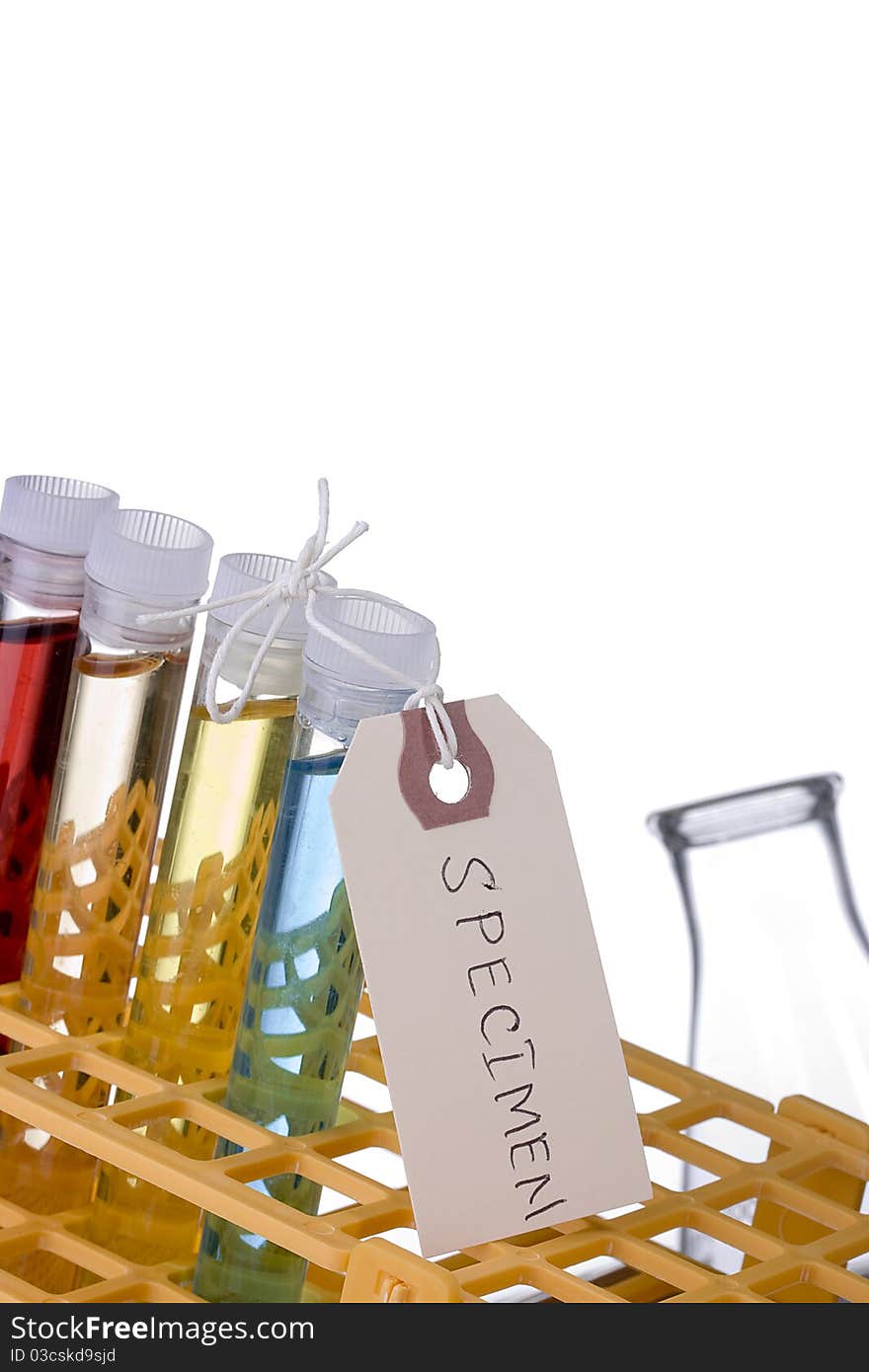 Test tubes in a test tube rack on a white background.