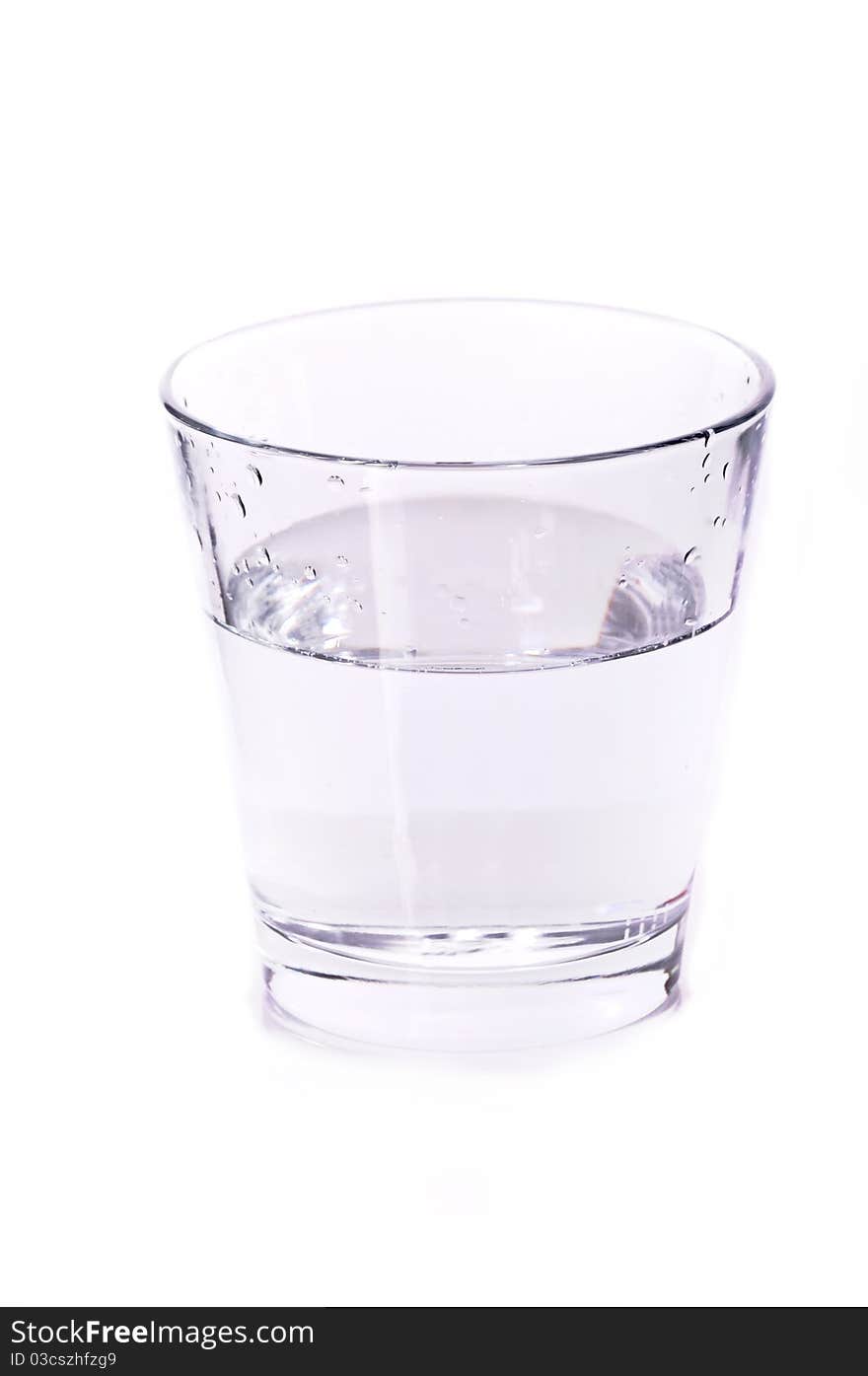 Glass of water on white background