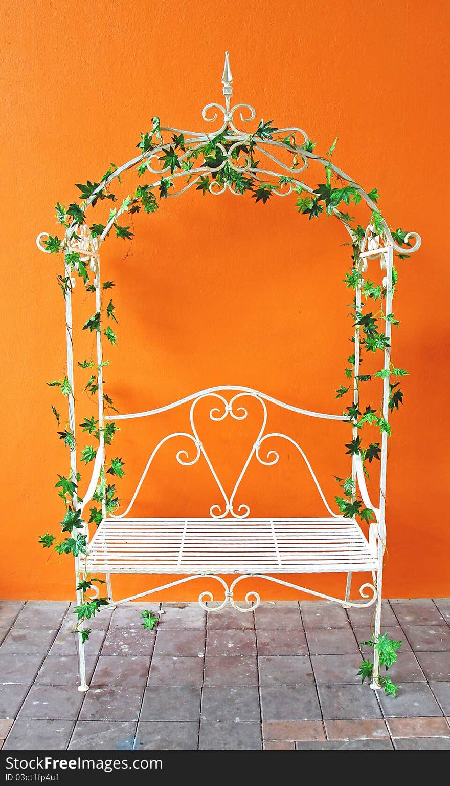 White Romantic Vintage Chair With Orange Wall