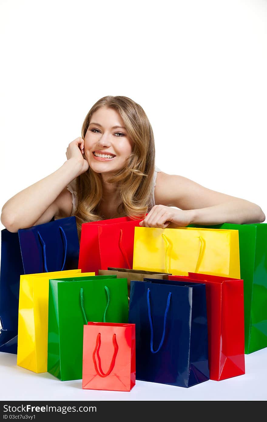 Young woman with a lot of shopping bags. Young woman with a lot of shopping bags