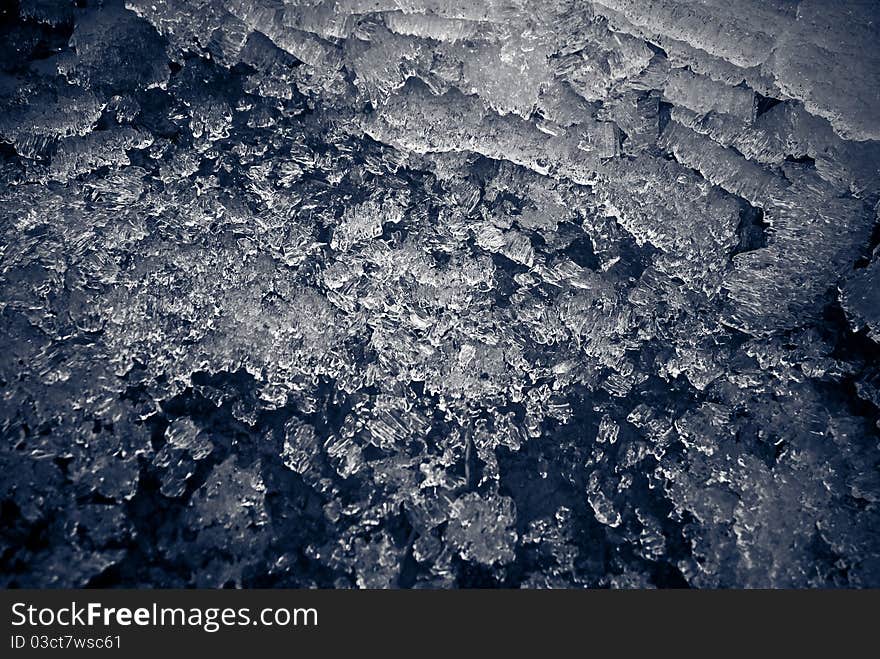 Beautiful ice crystals background tint in blue