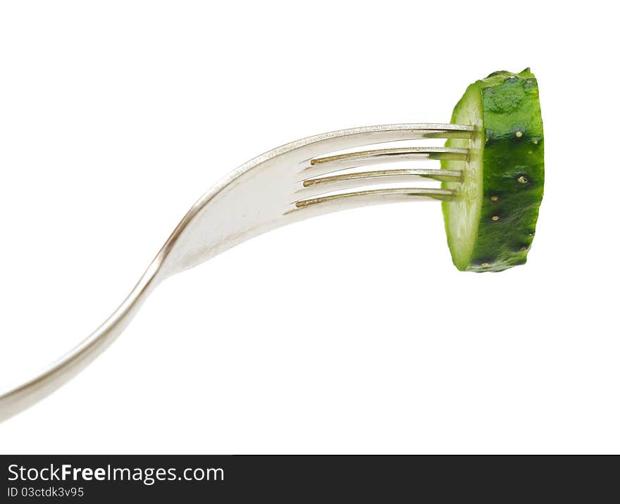 Cucumber on fork