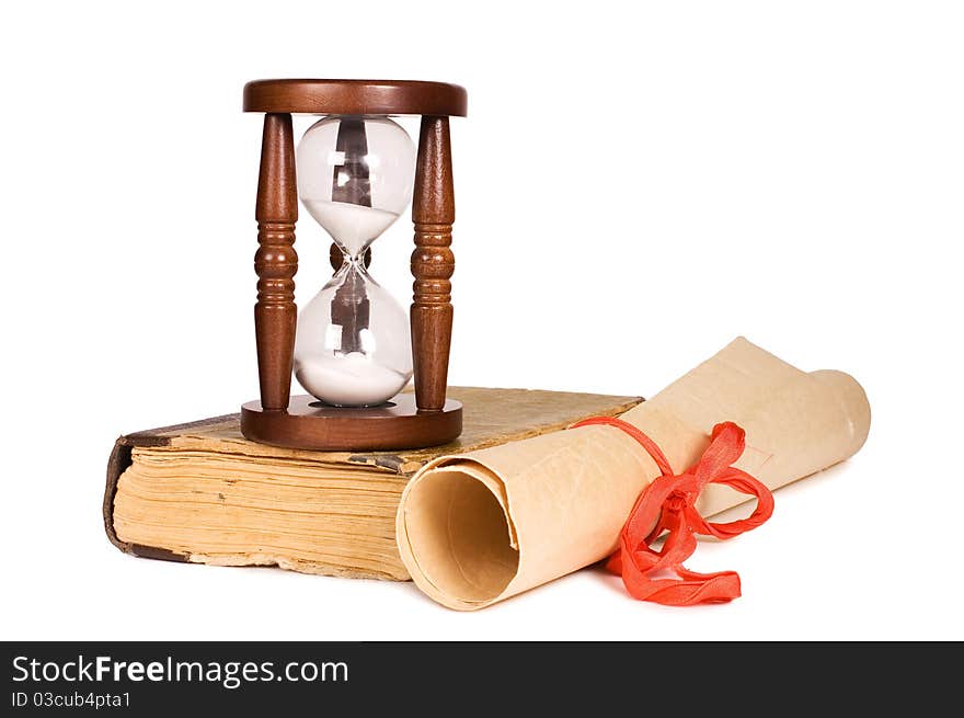 Hourglasses and book isolated on white background