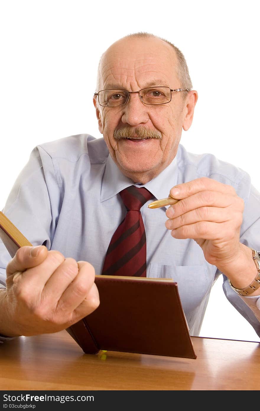 Businessman Does Records In A Notebook