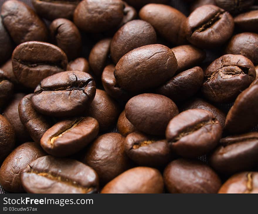 Assorted roasted coffee beans background