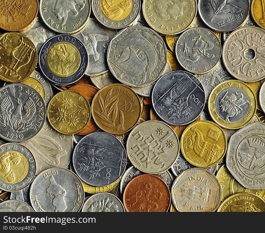 Various old coins on a flat surface. Various old coins on a flat surface