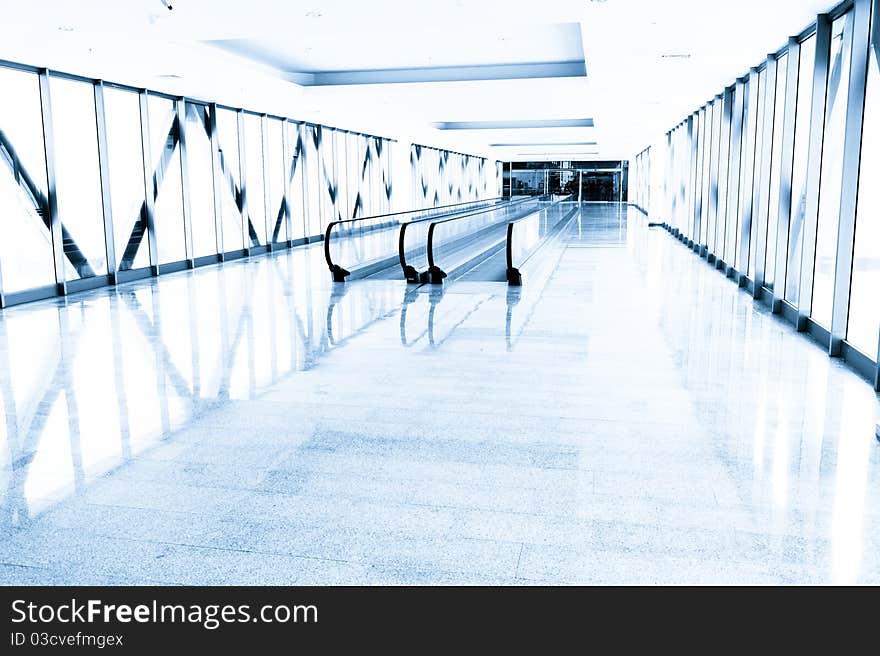 Blue Glass Corridor In Office Centre