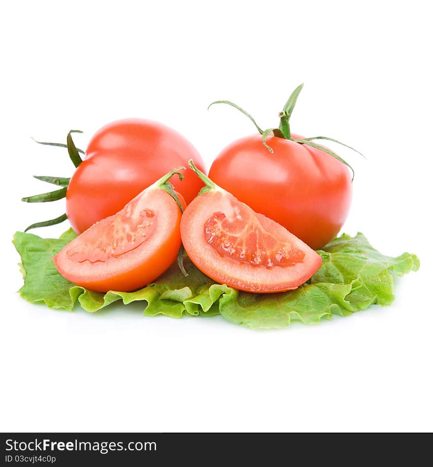 Two fresh red tomato with cut isolated on white