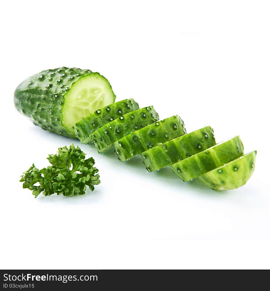 Cucumber and slices isolated over white background.