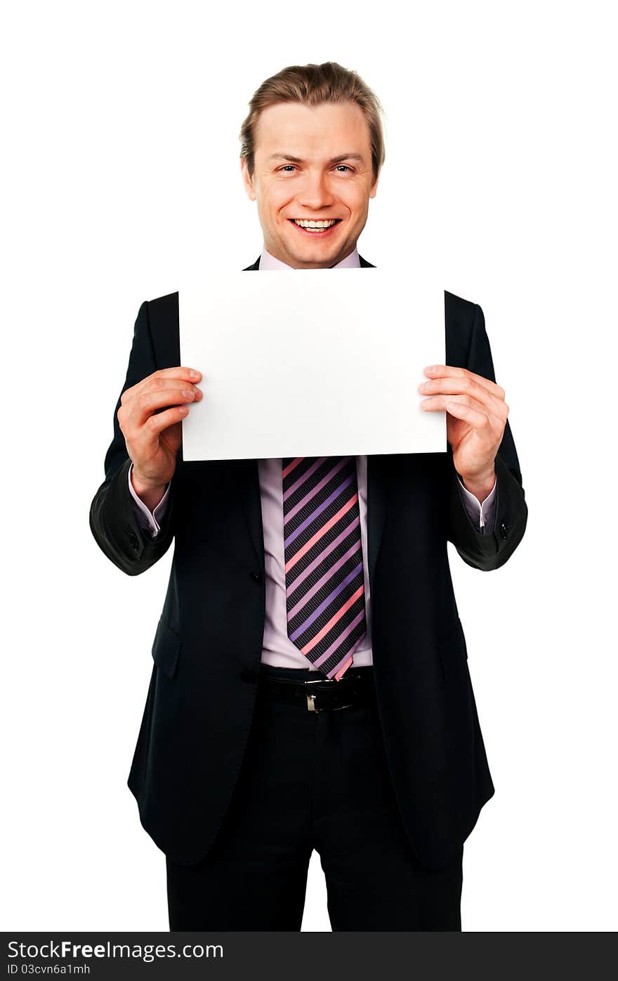 Isolated on white young handsome smiling man with white card. Isolated on white young handsome smiling man with white card