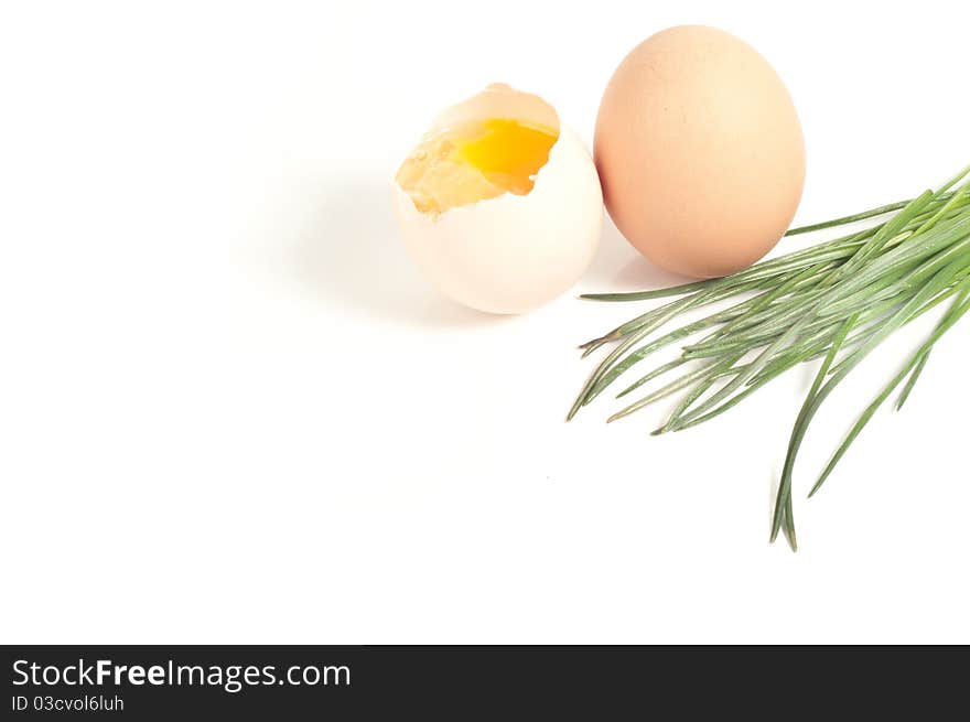 Cracked egg closeup on isolated white background