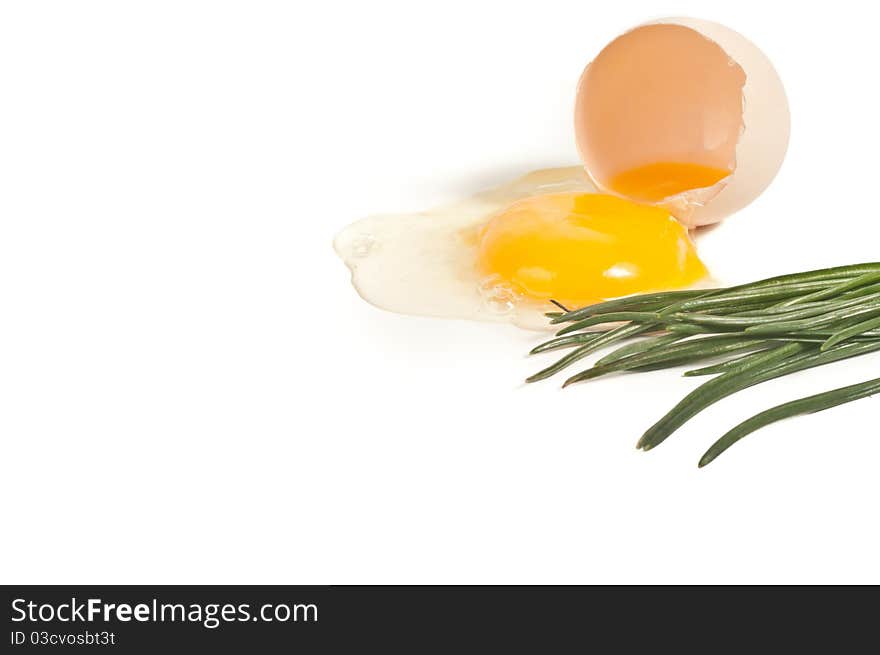 Cracked egg closeup on isolated white background