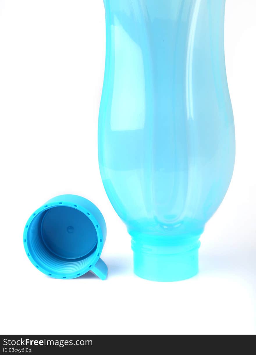 Empty plastic water bottle on a white background. Empty plastic water bottle on a white background