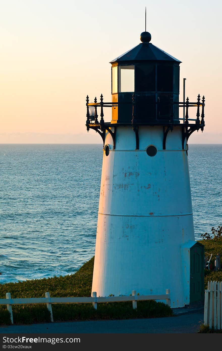 Point Montara Lighthouse on a clear day at sunset.