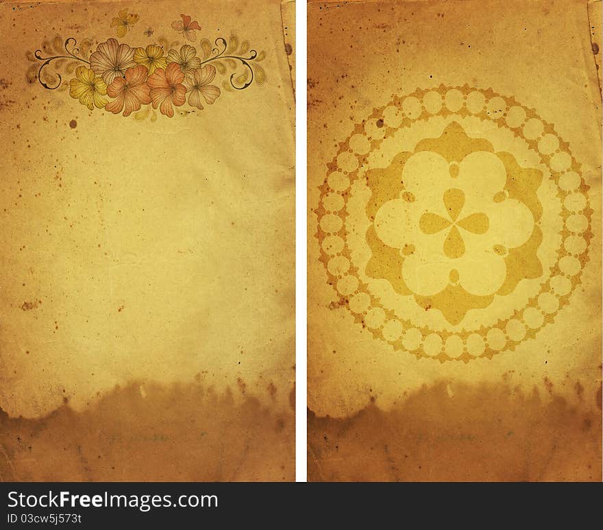 Old yellow-brown grunge paper with flowers. Old yellow-brown grunge paper with flowers