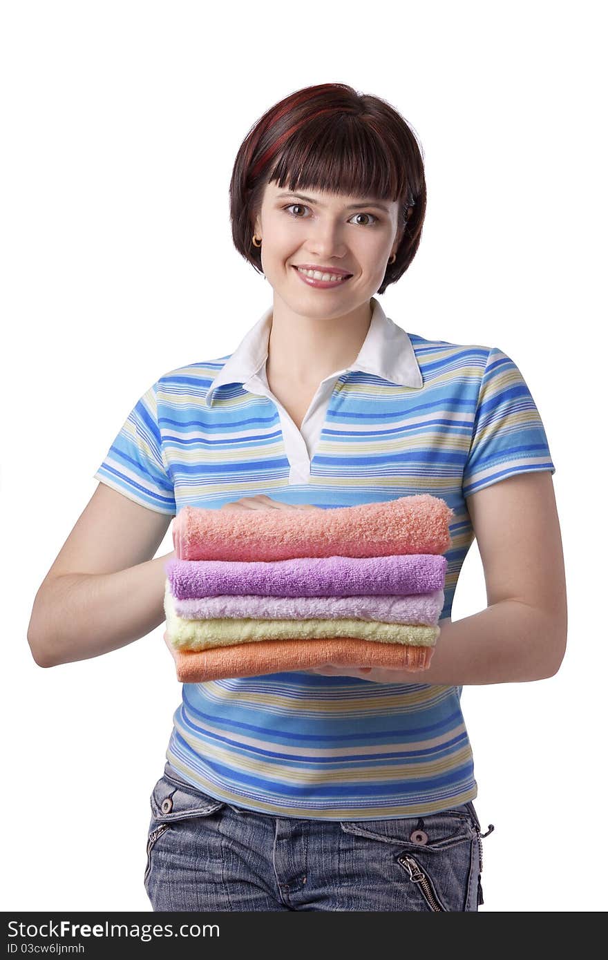 Woman holding clean towels