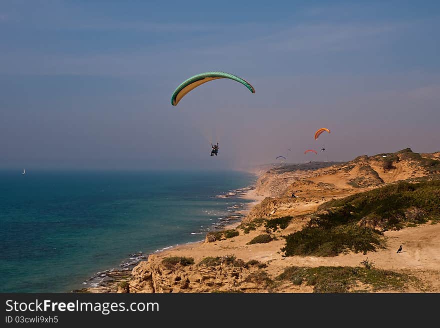 Paraglider over  Mediterranean sea .