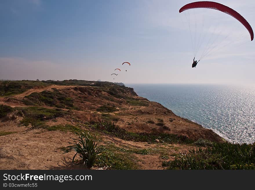 Paraglider over  Mediterranean sea .