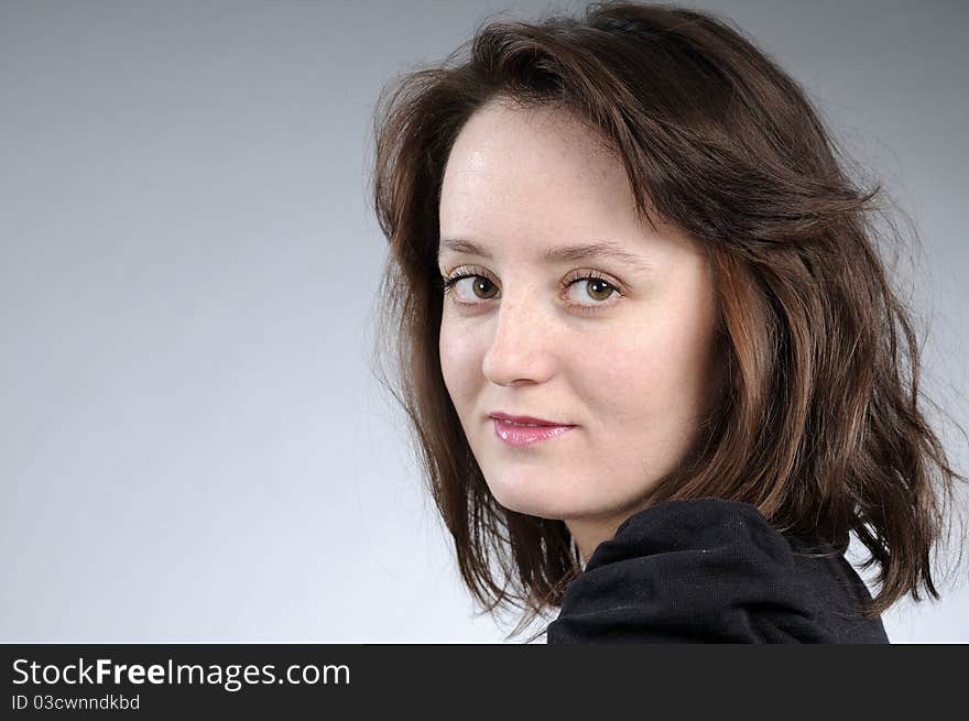 Caucasian attractive person smiling in studio. Caucasian attractive person smiling in studio