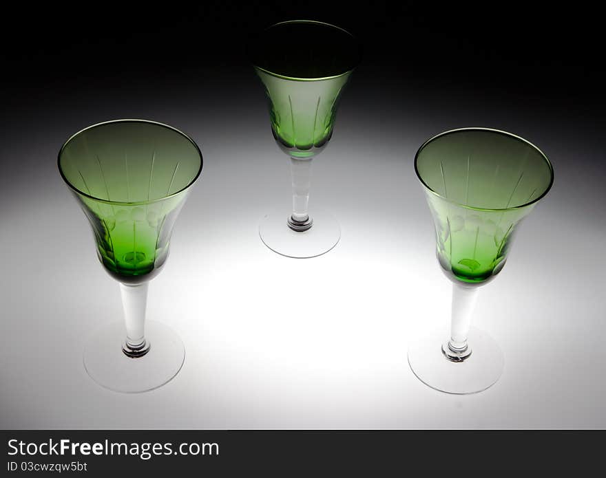 Three glasses of green glass. Three glasses of green glass