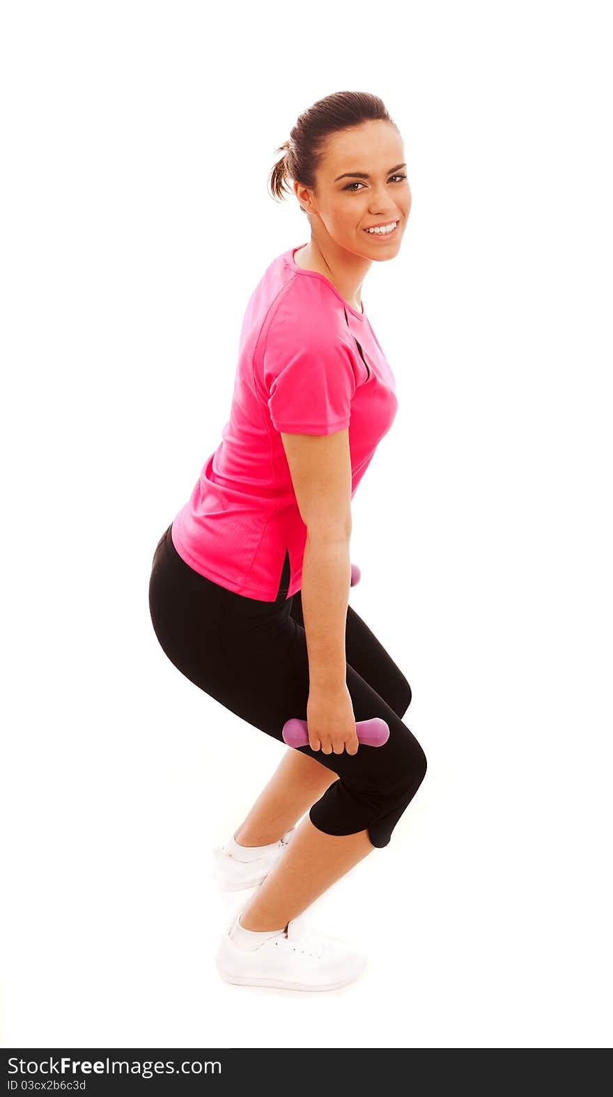 A girl performing a lunge using weights on a white background. A girl performing a lunge using weights on a white background